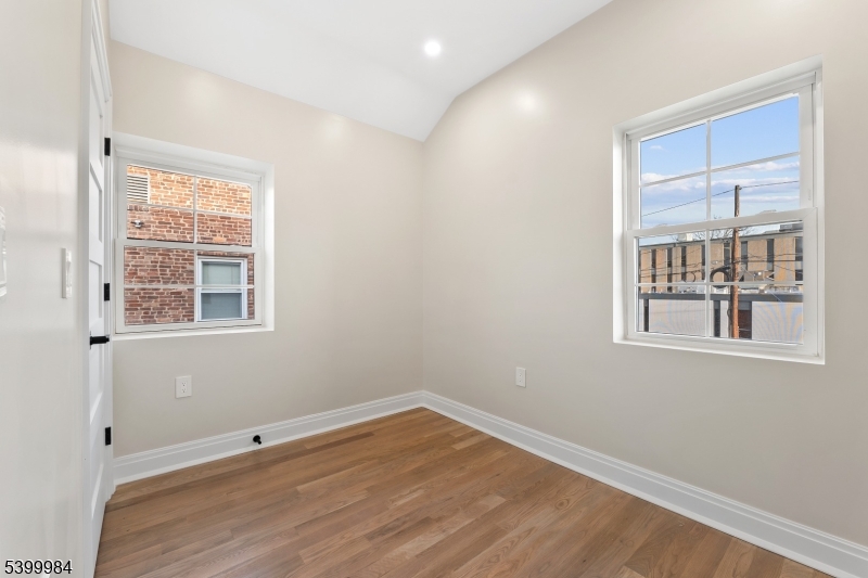 1453 Morris Avenue Union, NJ 07083 - Photo 28 of 48 an empty room with a window