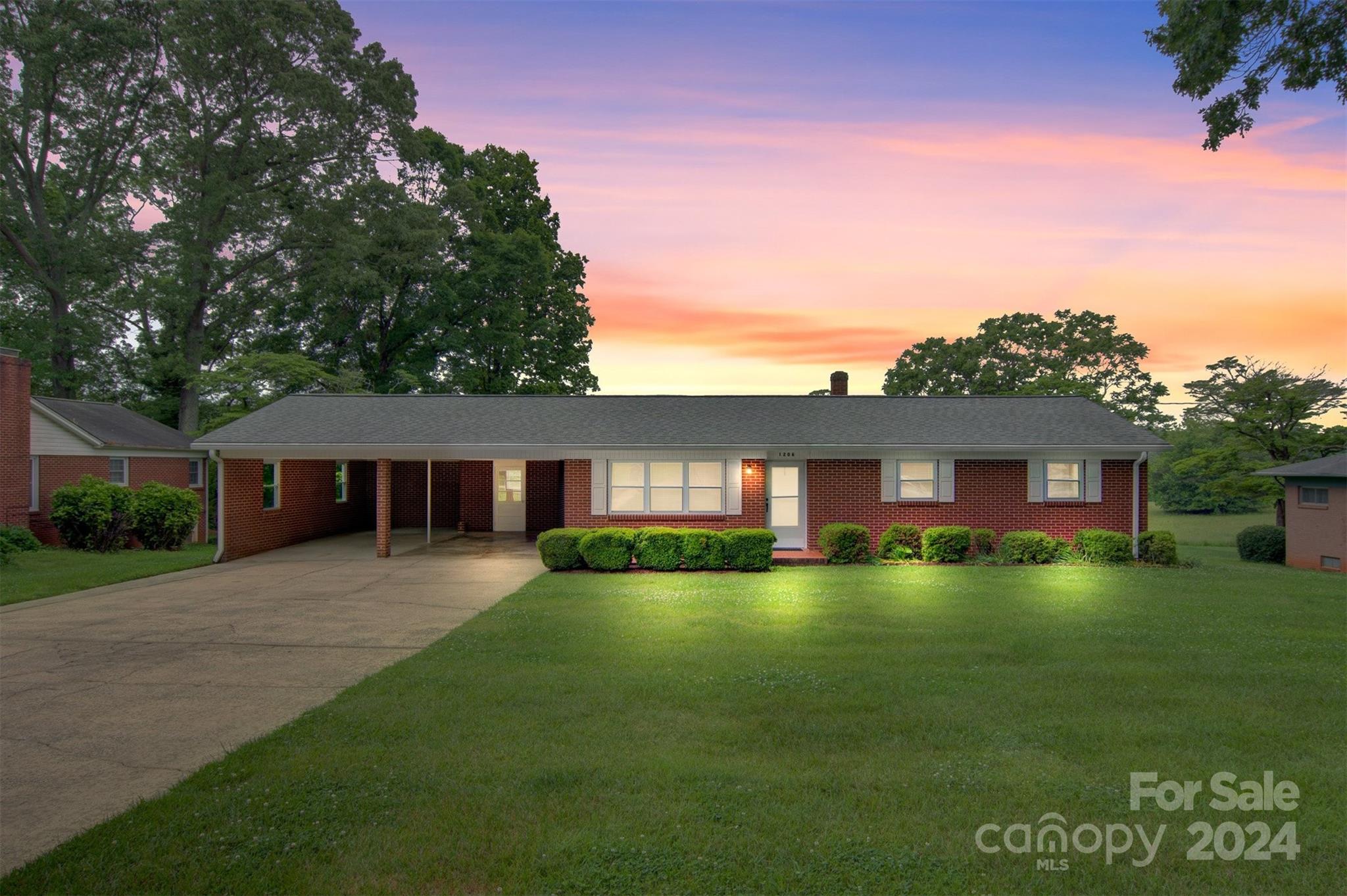 1206 4th St Drive Southeast Conover, NC 28613 - Photo 1 of 33 a front view of a house with garden