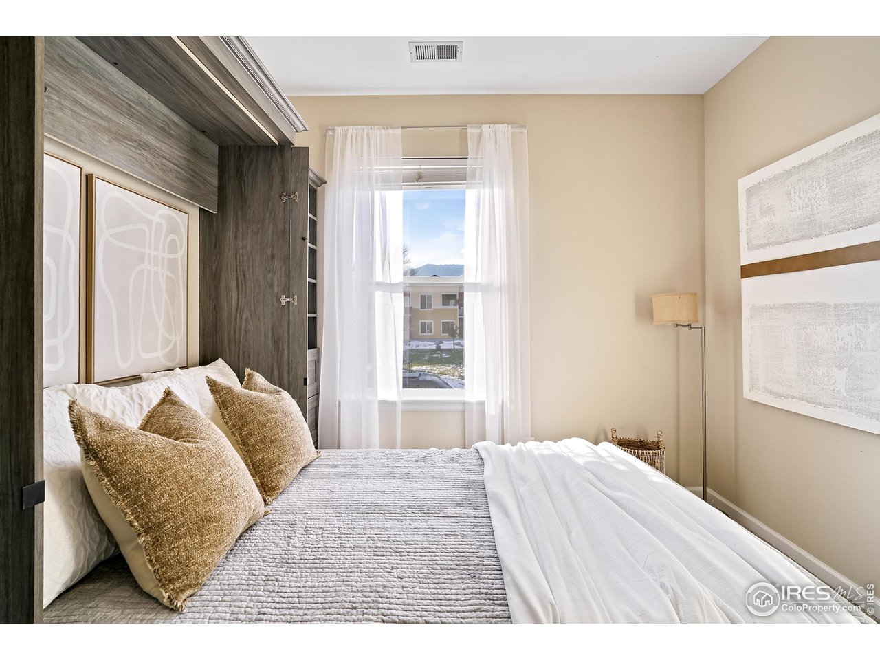 2625 Tabriz Place, Unit 21 Boulder, CO 80304 - Photo 12 of 24 a bedroom with a bed and a window