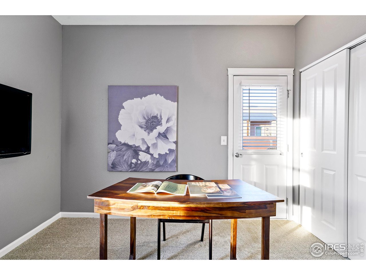 2625 Tabriz Place, Unit 21 Boulder, CO 80304 - Photo 15 of 24 a room with a table and a painting