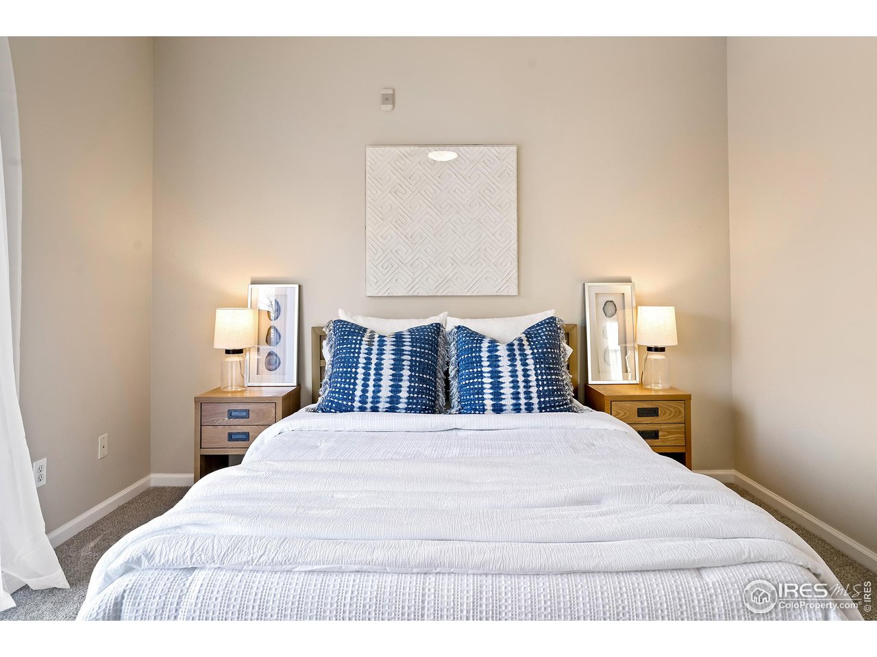 2625 Tabriz Place, Unit 21 Boulder, CO 80304 - Photo 17 of 24 a bedroom with a large bed and a night stand