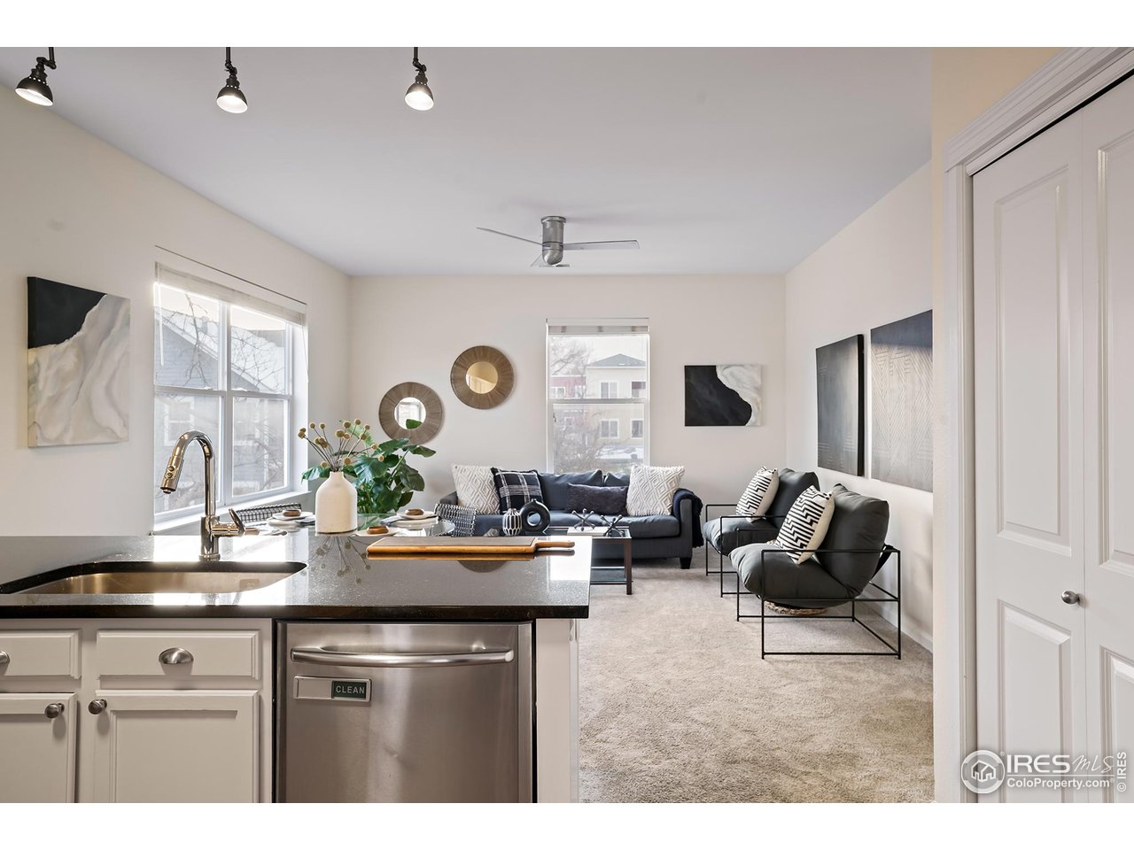 2625 Tabriz Place, Unit 21 Boulder, CO 80304 - Photo 5 of 24 a kitchen with a sink and a refrigerator