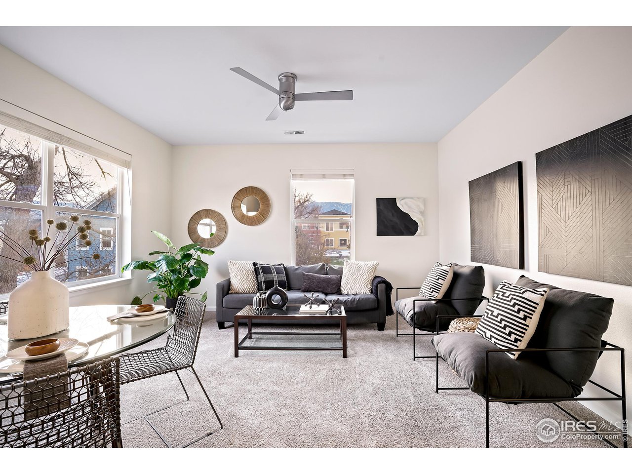 2625 Tabriz Place, Unit 21 Boulder, CO 80304 - Photo 24 of 24 a living room with furniture and wooden floor