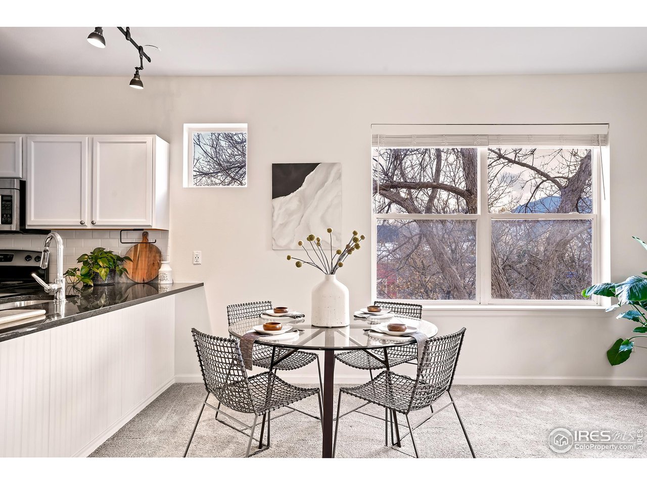 2625 Tabriz Place, Unit 21 Boulder, CO 80304 - Photo 8 of 24 a dining room with furniture and window