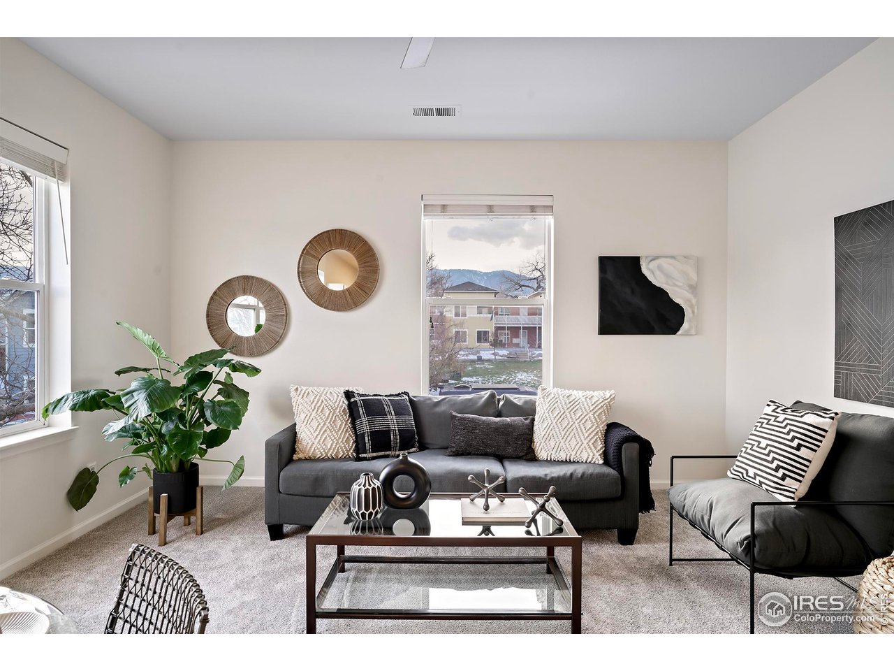 2625 Tabriz Place, Unit 21 Boulder, CO 80304 - Photo 9 of 24 a living room with furniture rug and window