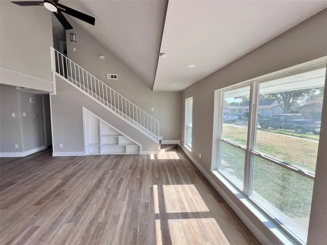 a view of entryway with wooden floor