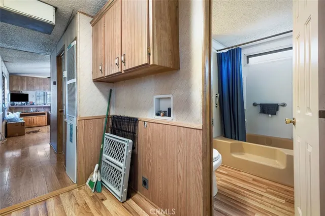 a view of a kitchen from the hallway