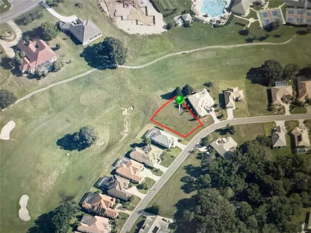 an aerial view of a house with outdoor space