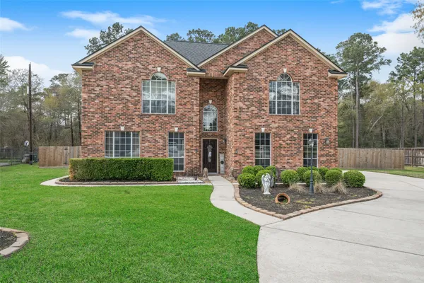 $585,000 | 2438 Ripplewood Drive, Conroe, TX 77384