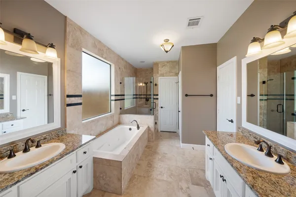 $585,000 | 2438 Ripplewood Drive, Conroe, TX 77384