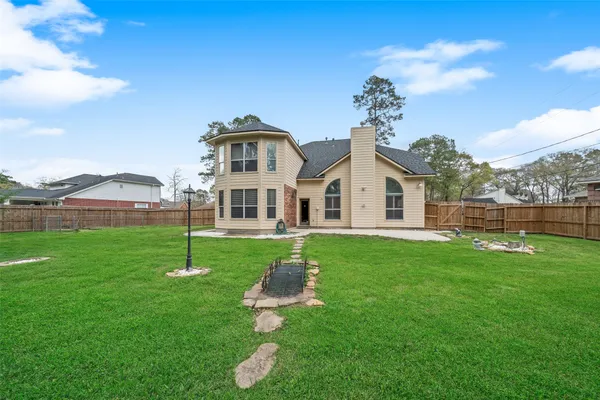 $585,000 | 2438 Ripplewood Drive, Conroe, TX 77384