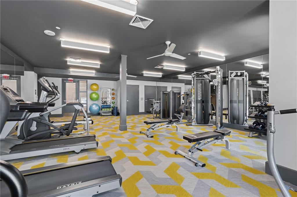 775 Juniper Street Northeast, Unit 227 Atlanta, GA 30308 - Photo 25 of 42 a view of a room with gym equipment