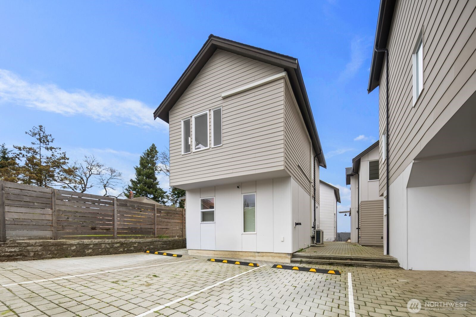 2211 17th Avenue South Seattle, WA 98144 - Photo 24 of 25 a front view of a house with a garage