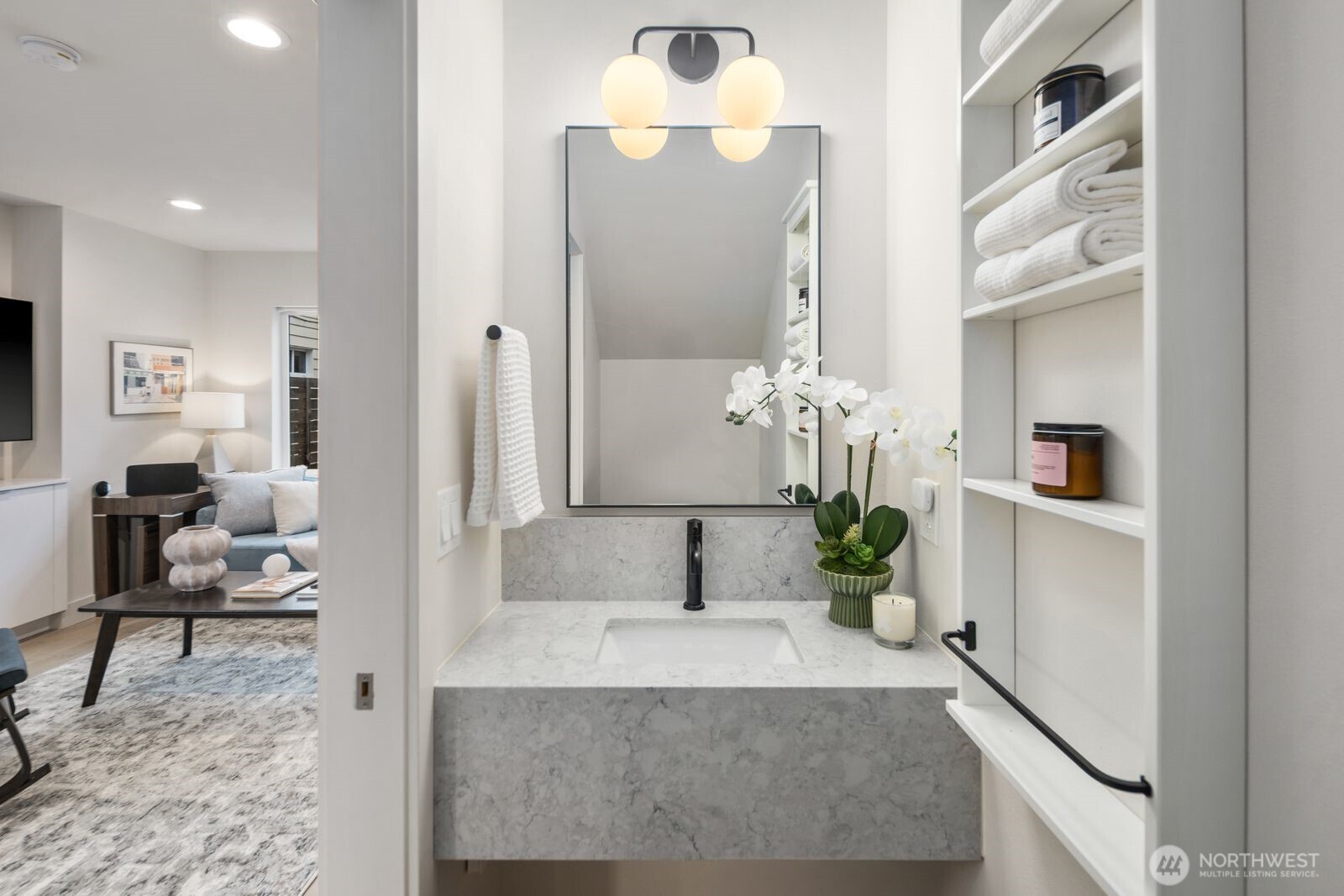 2211 17th Avenue South Seattle, WA 98144 - Photo 7 of 25 a living room with furniture and a chandelier