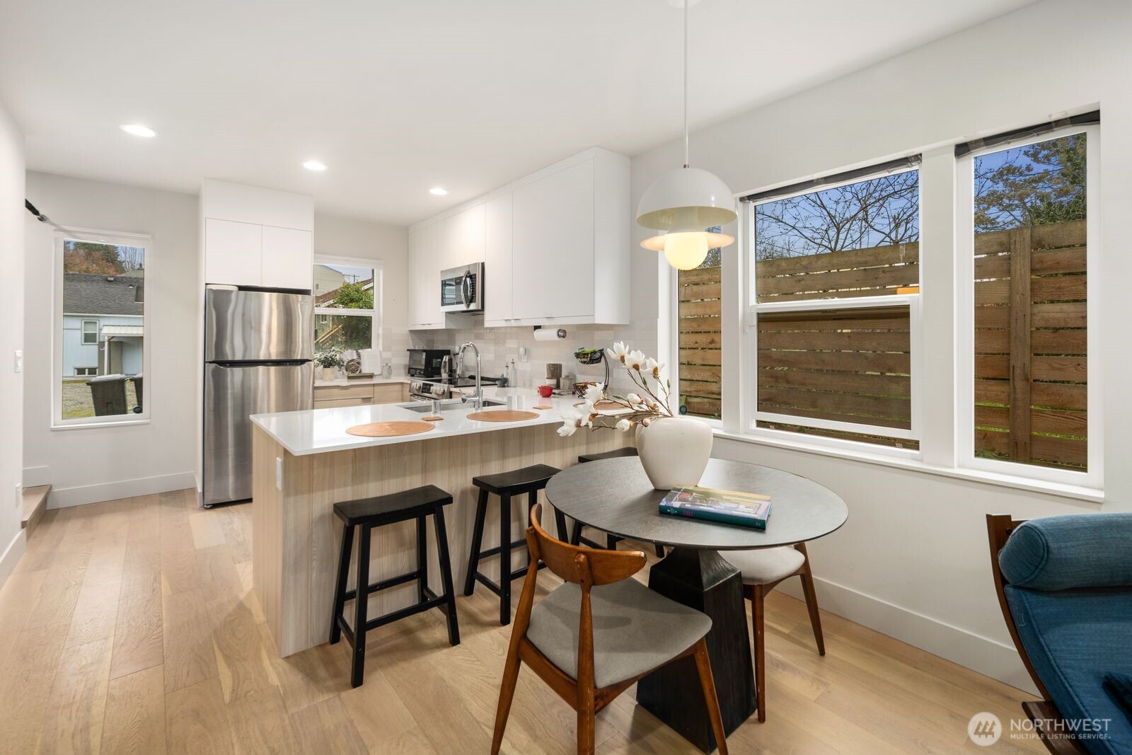 2211 17th Avenue South Seattle, WA 98144 - Photo 8 of 25 a view of a dining room with furniture window and outside view