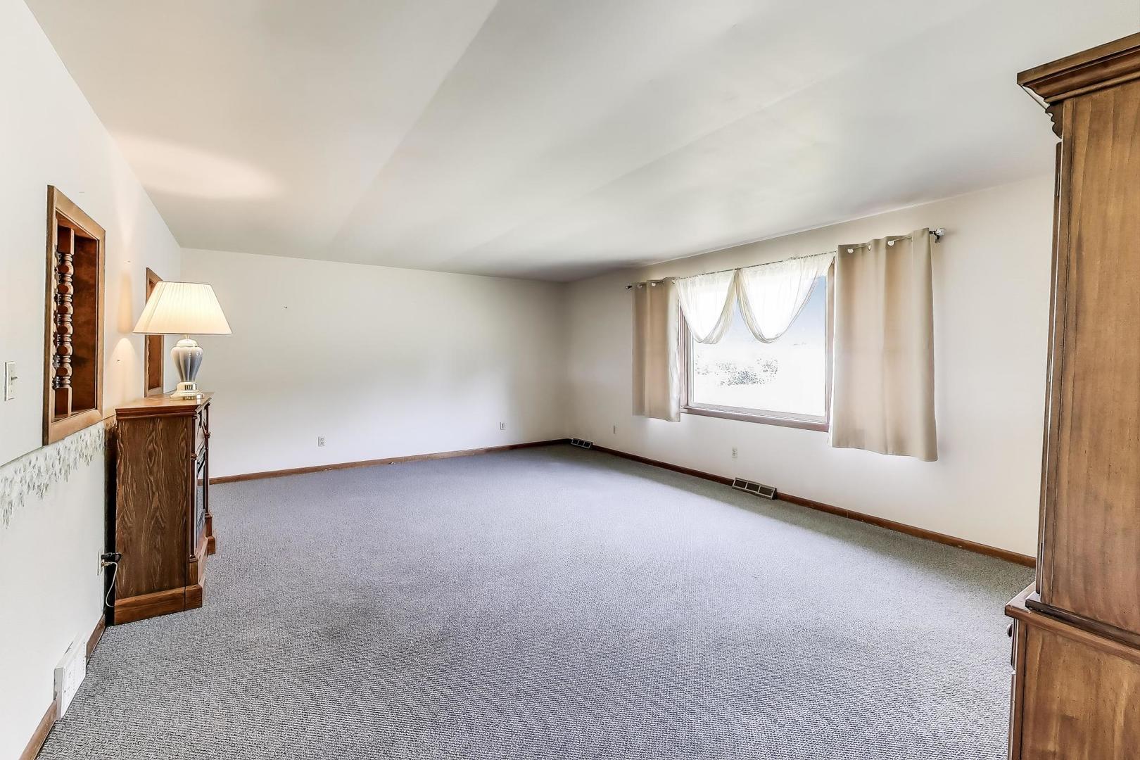 7008 West Kennedy Road Peotone, IL 60468 - Photo 13 of 41 an empty room with windows