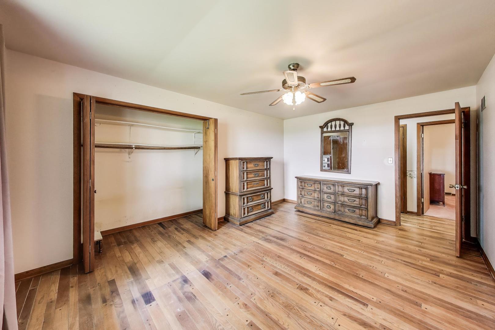 7008 West Kennedy Road Peotone, IL 60468 - Photo 20 of 41 a living room with furniture and a wooden floor