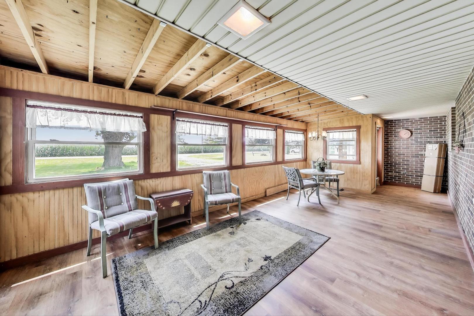7008 West Kennedy Road Peotone, IL 60468 - Photo 4 of 41 a living room with furniture and a large window