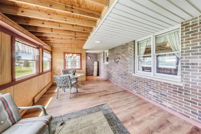 a outdoor space with lots of furniture and windows