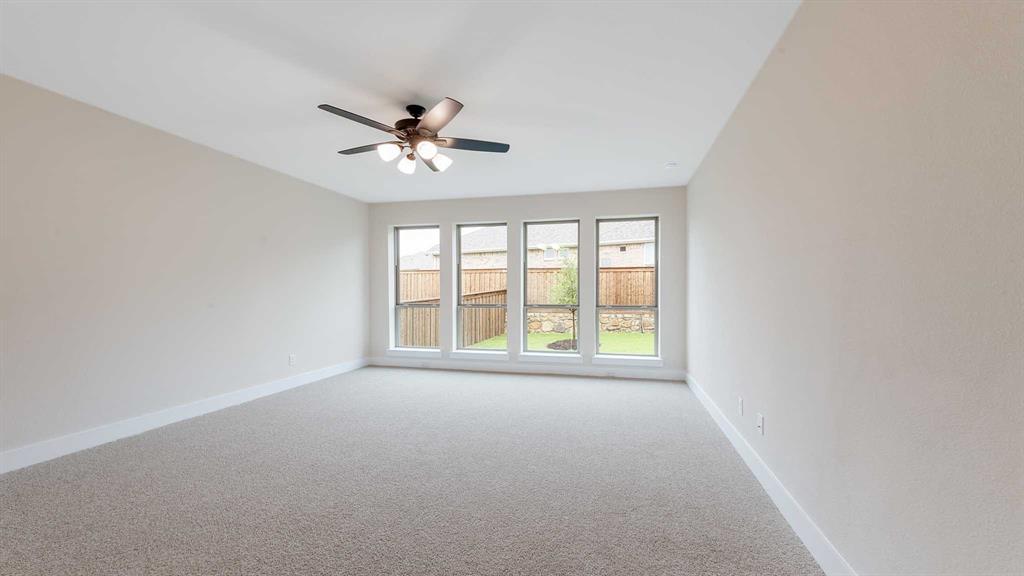 854 Stoney Bridge Way Lavon, TX 75166 - Photo 16 of 36 a view of an empty room with a window