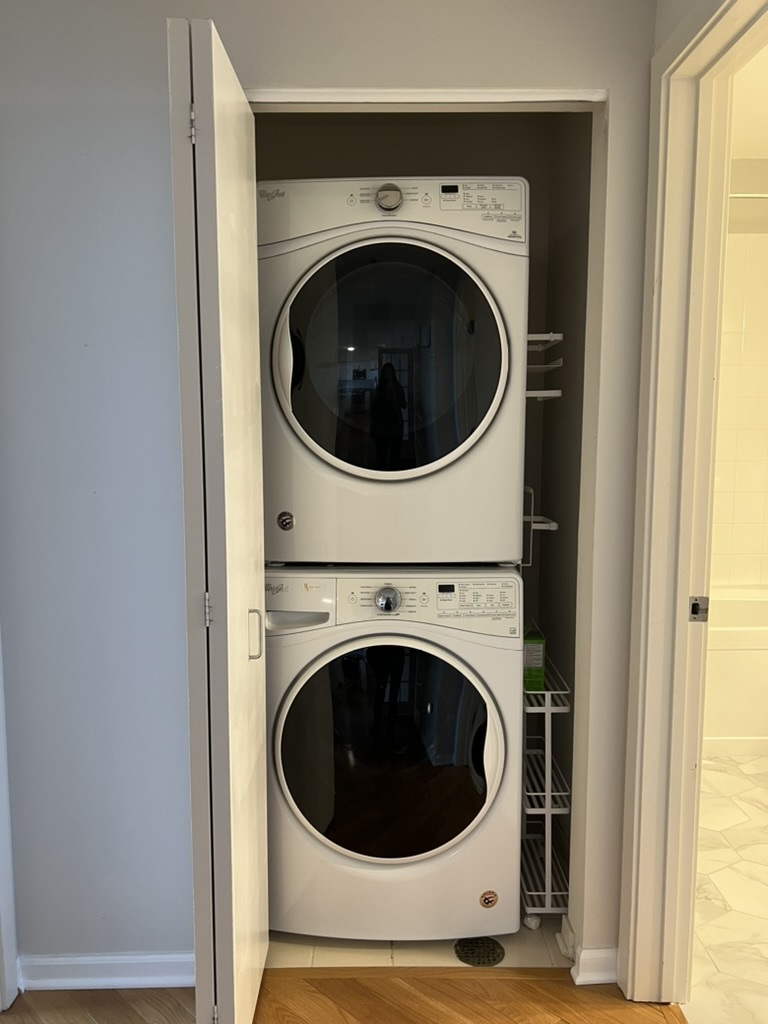 807 Davis Street, Unit 1308 Evanston, IL 60201 - Photo 16 of 16 a view of a hallway with washer and dryer