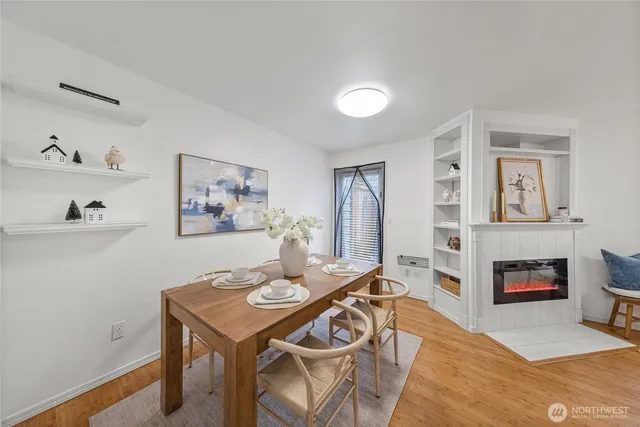 a view of a livingroom with furniture and a fireplace