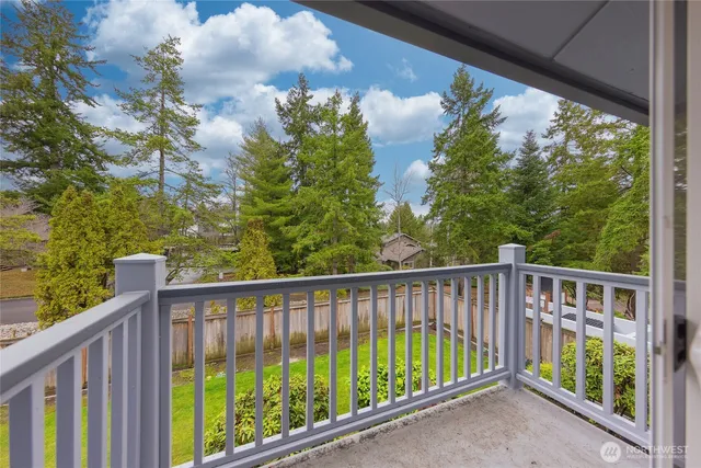 a view of a street view from a balcony