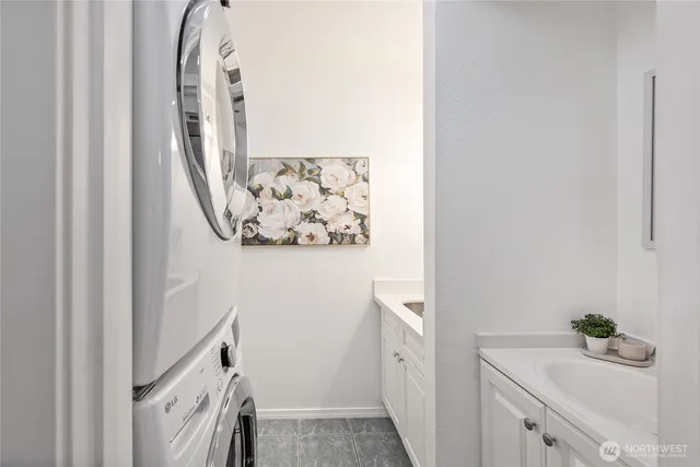 a view of a hallway to rooms