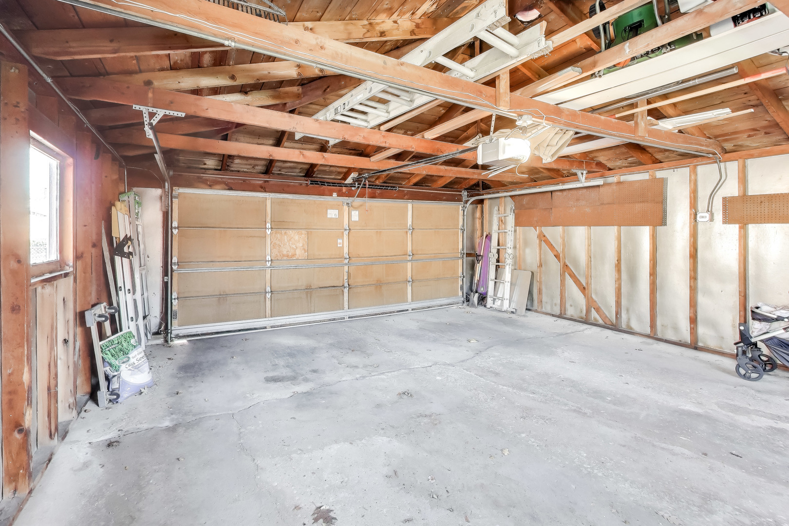 8049 North Osceola Avenue Niles, IL 60714 - Photo 5 of 7 a view of empty room with wooden walls