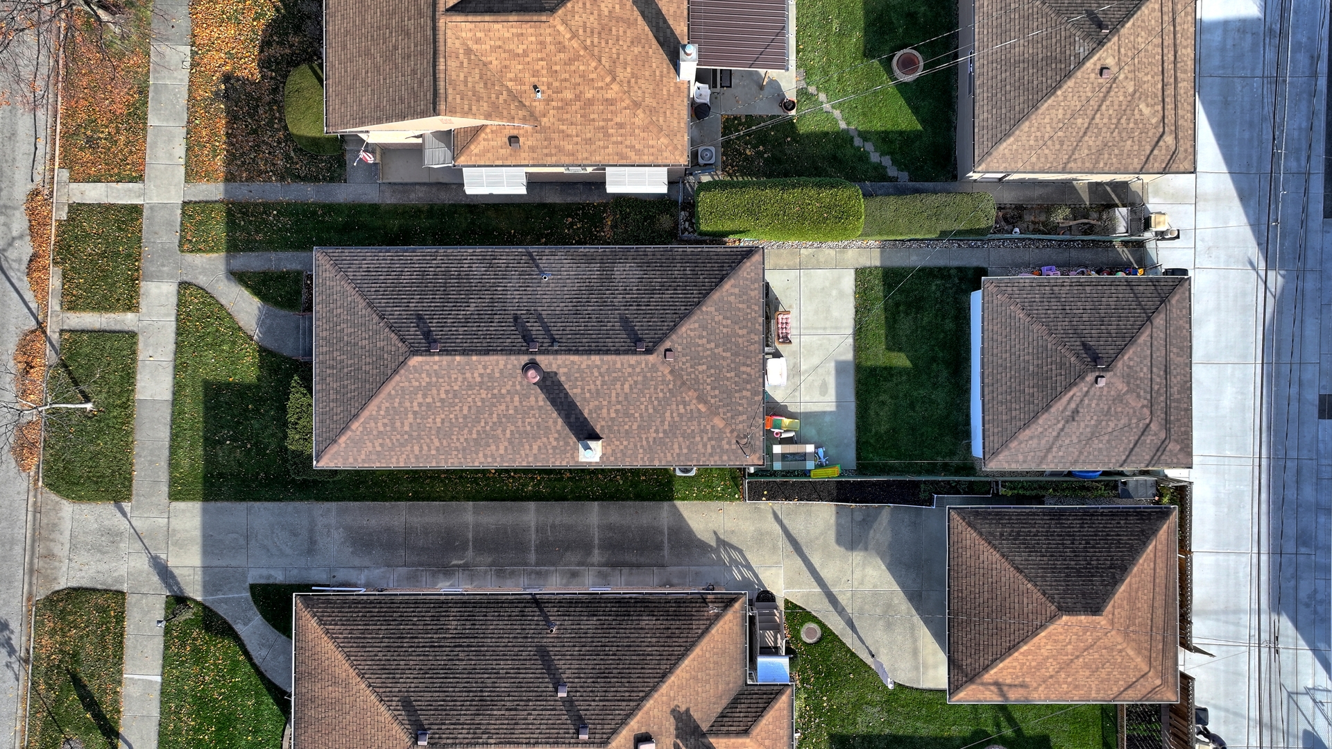 8049 North Osceola Avenue Niles, IL 60714 - Photo 7 of 7 an aerial view of a house with a garden and swimming pool