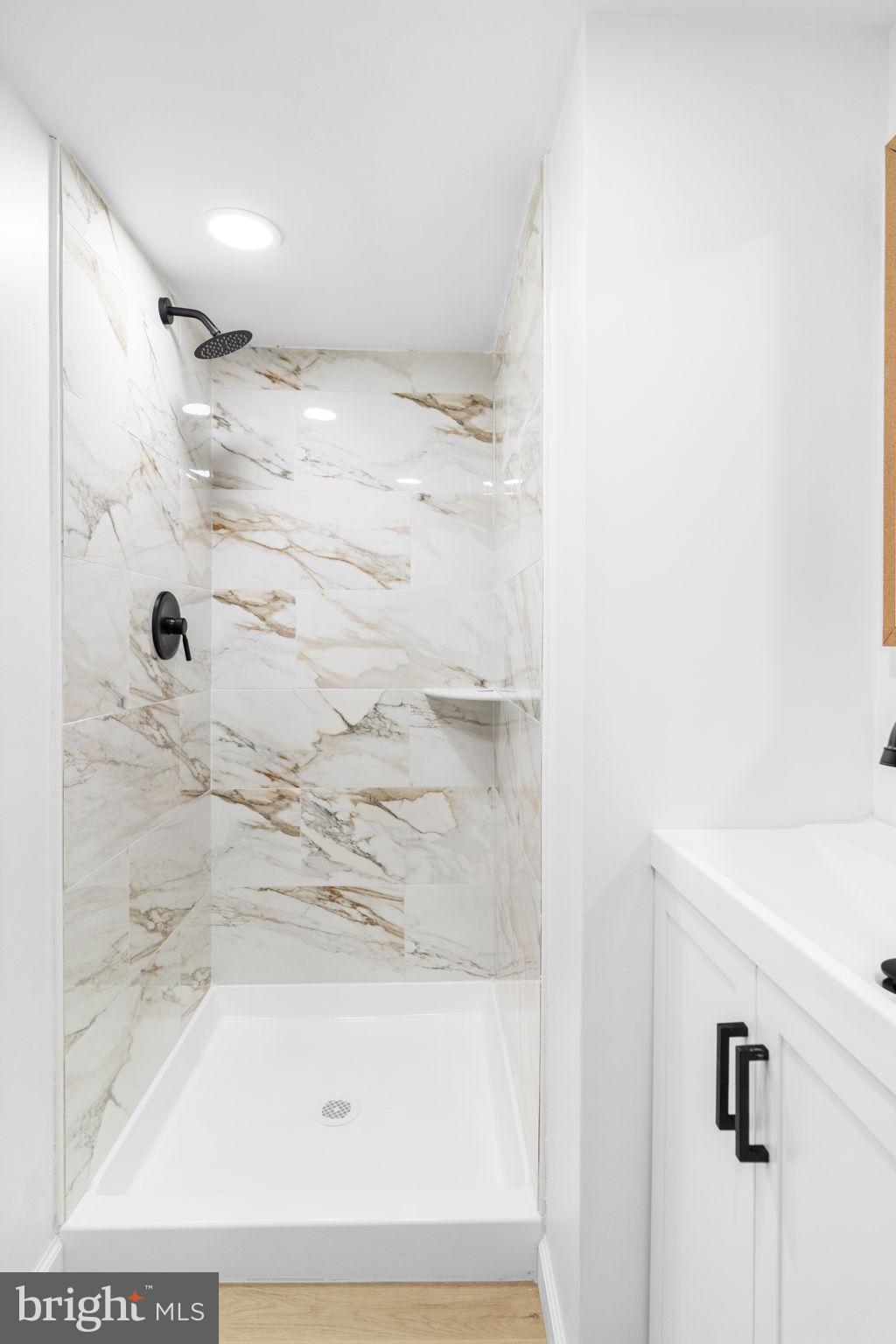 7703 Gilbert Street Philadelphia, PA 19150 - Photo 17 of 37 a bathroom with a shower