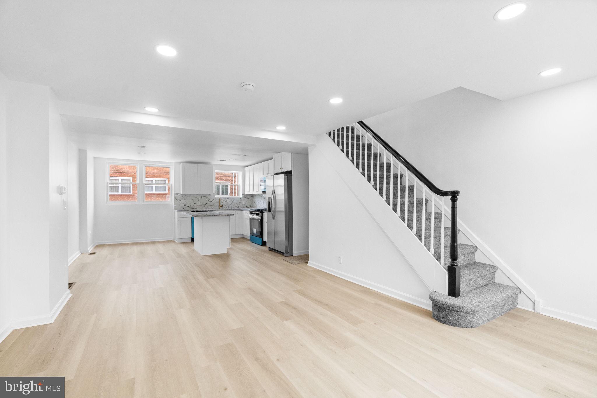 7703 Gilbert Street Philadelphia, PA 19150 - Photo 2 of 37 a view of an empty room with wooden floor