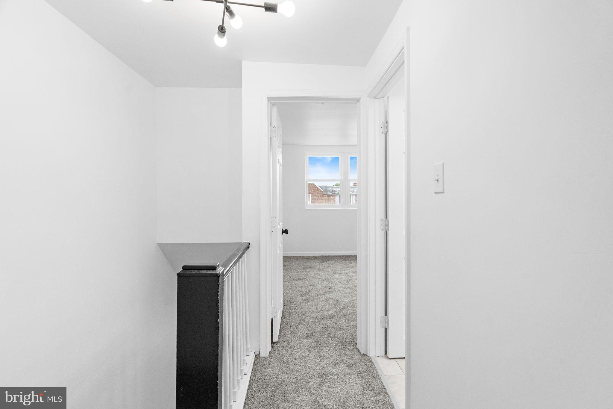 7703 Gilbert Street Philadelphia, PA 19150 - Photo 22 of 37 a view of a room with door