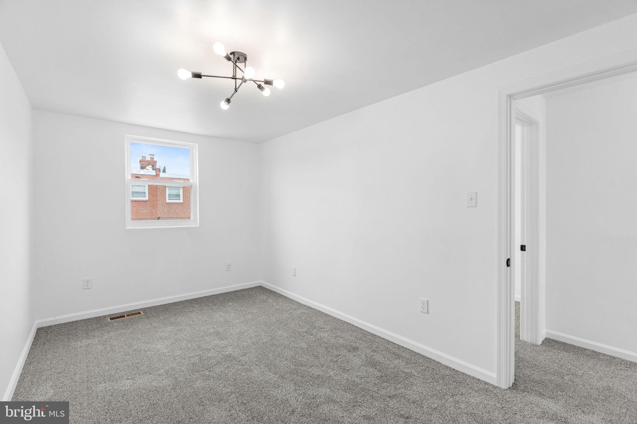 7703 Gilbert Street Philadelphia, PA 19150 - Photo 32 of 37 a view of an empty room with a window