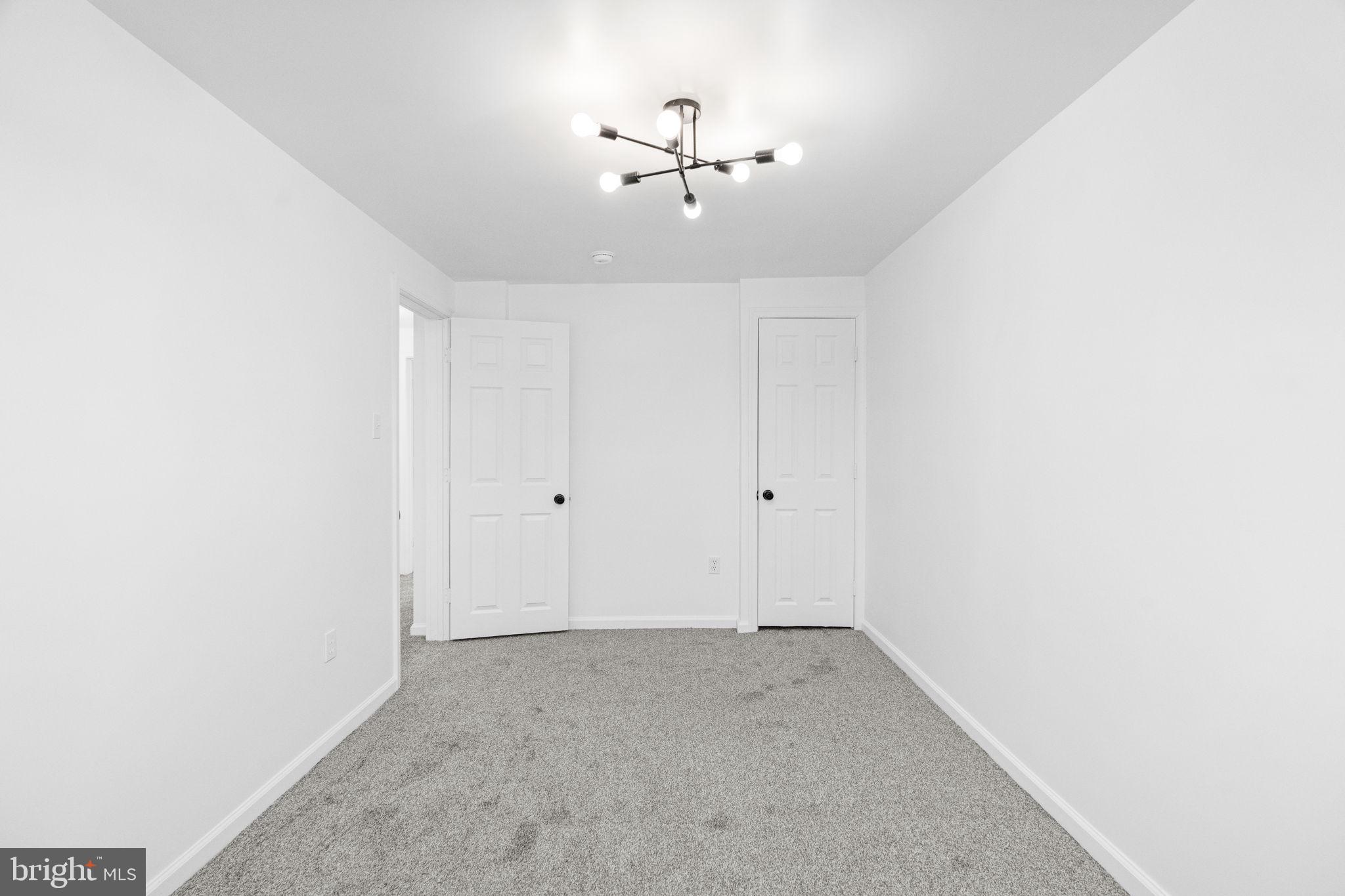7703 Gilbert Street Philadelphia, PA 19150 - Photo 33 of 37 a view of a room with ceiling fan and window