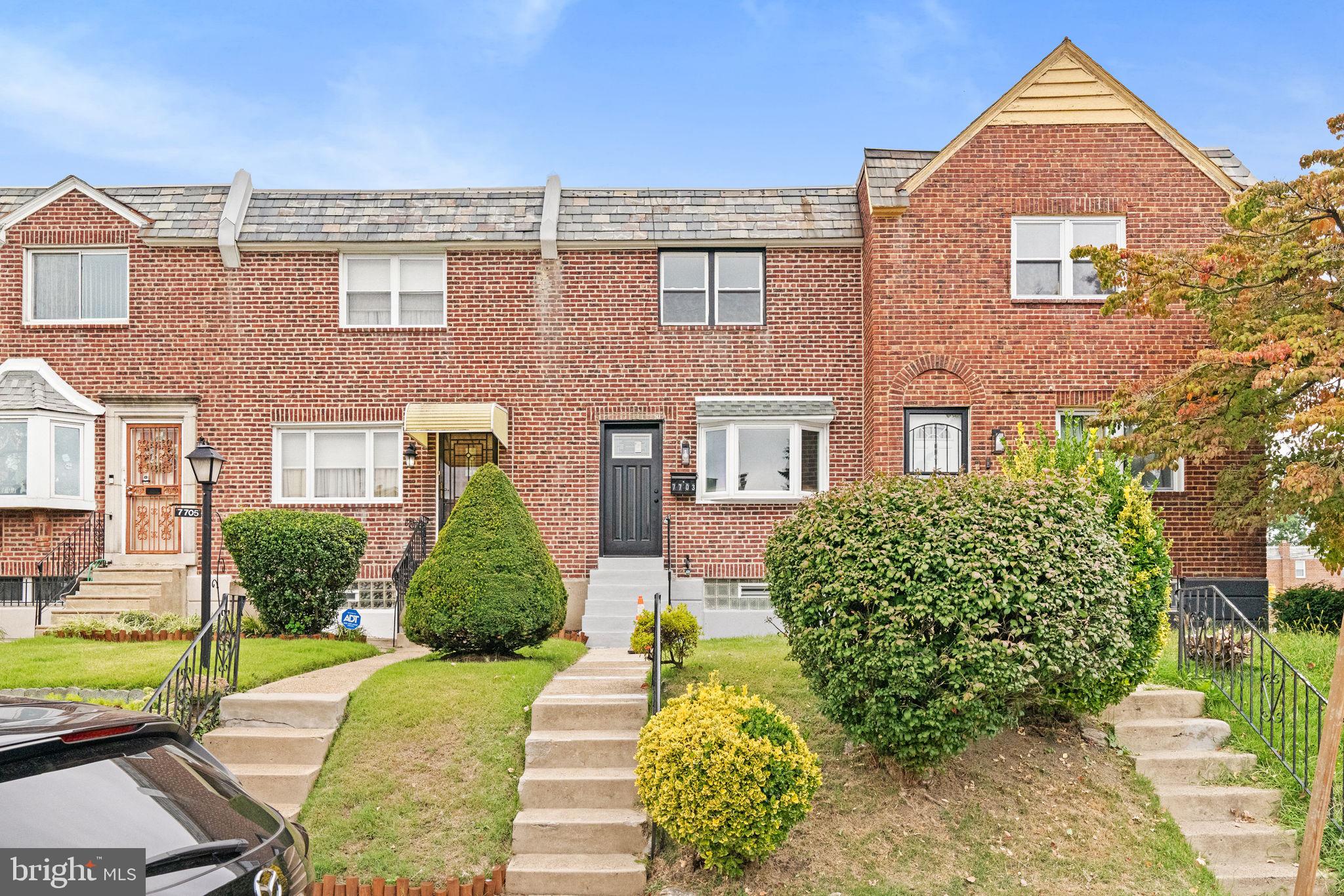 7703 Gilbert Street Philadelphia, PA 19150 - Photo 37 of 37 a front view of a house with garden