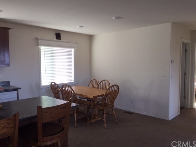 25432 Jerusalem Grde Lower Lake, CA 95457 - Photo 16 of 27 a view of a dining room with furniture