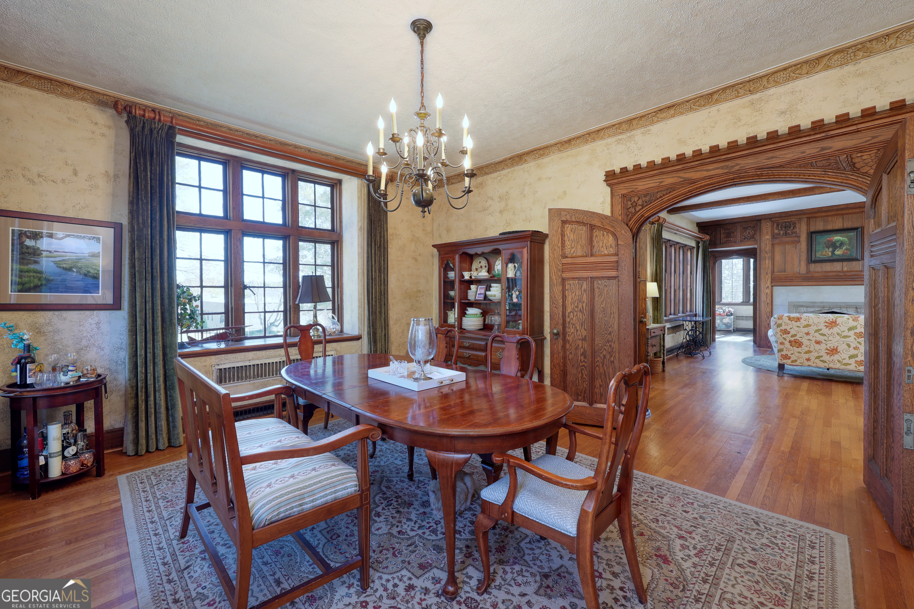 1007 4th Avenue West Point, GA 31833 - Photo 16 of 69 a view of a dining room with furniture and wooden floor