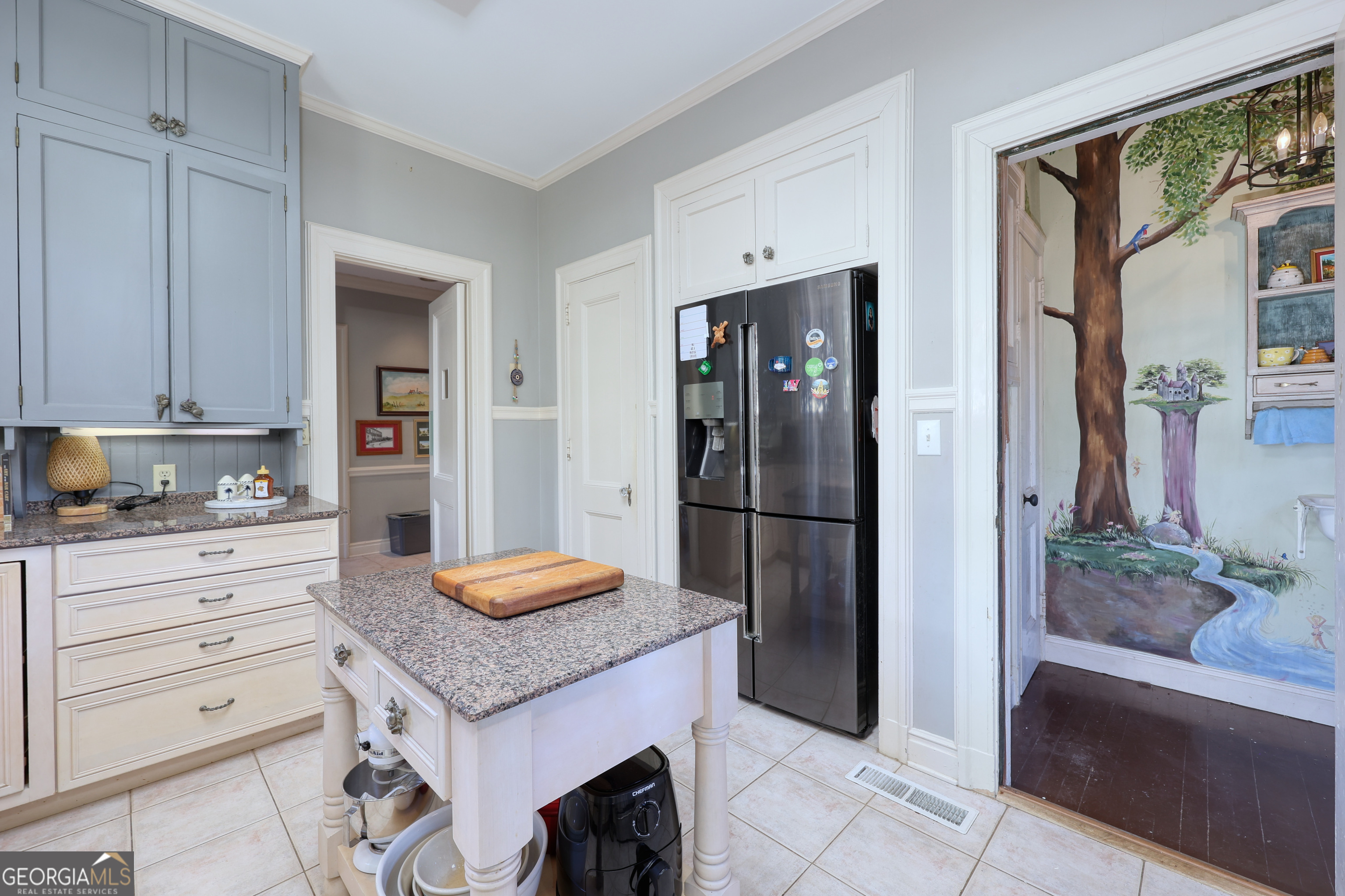 1007 4th Avenue West Point, GA 31833 - Photo 20 of 69 a kitchen with granite countertop a refrigerator and a sink