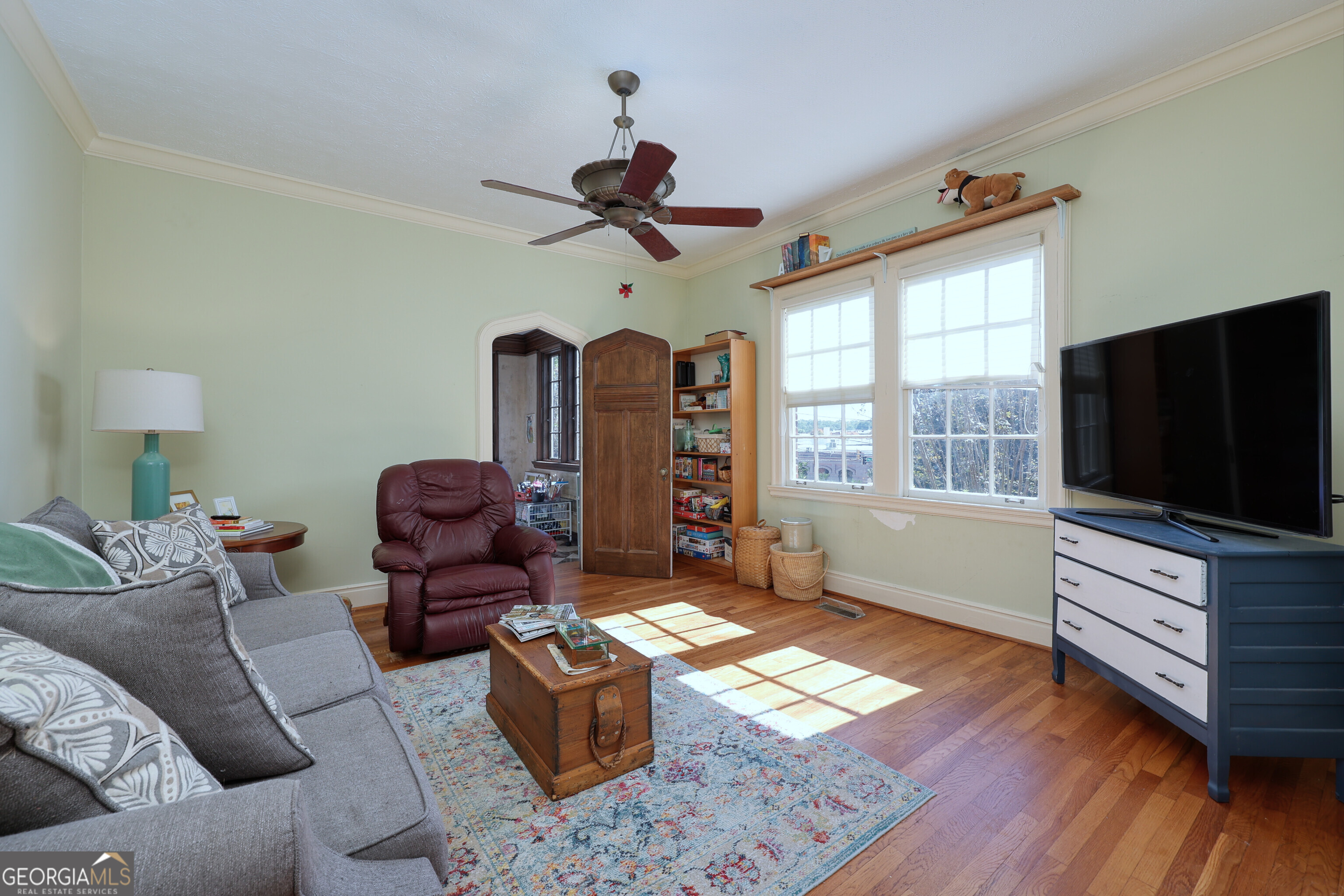 1007 4th Avenue West Point, GA 31833 - Photo 26 of 69 a living room with furniture and a flat screen tv