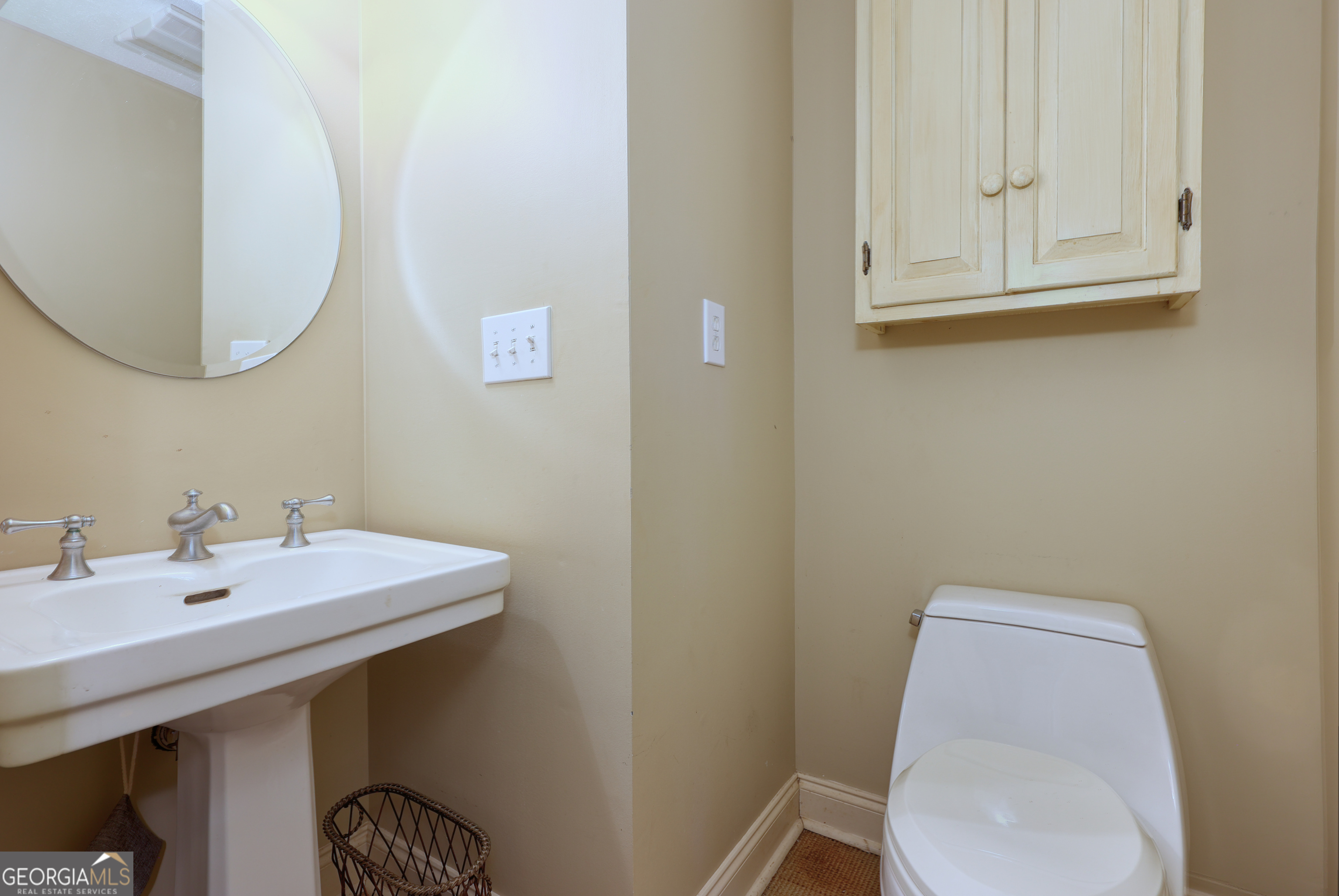 1007 4th Avenue West Point, GA 31833 - Photo 37 of 69 a bathroom with a sink mirror and toilet