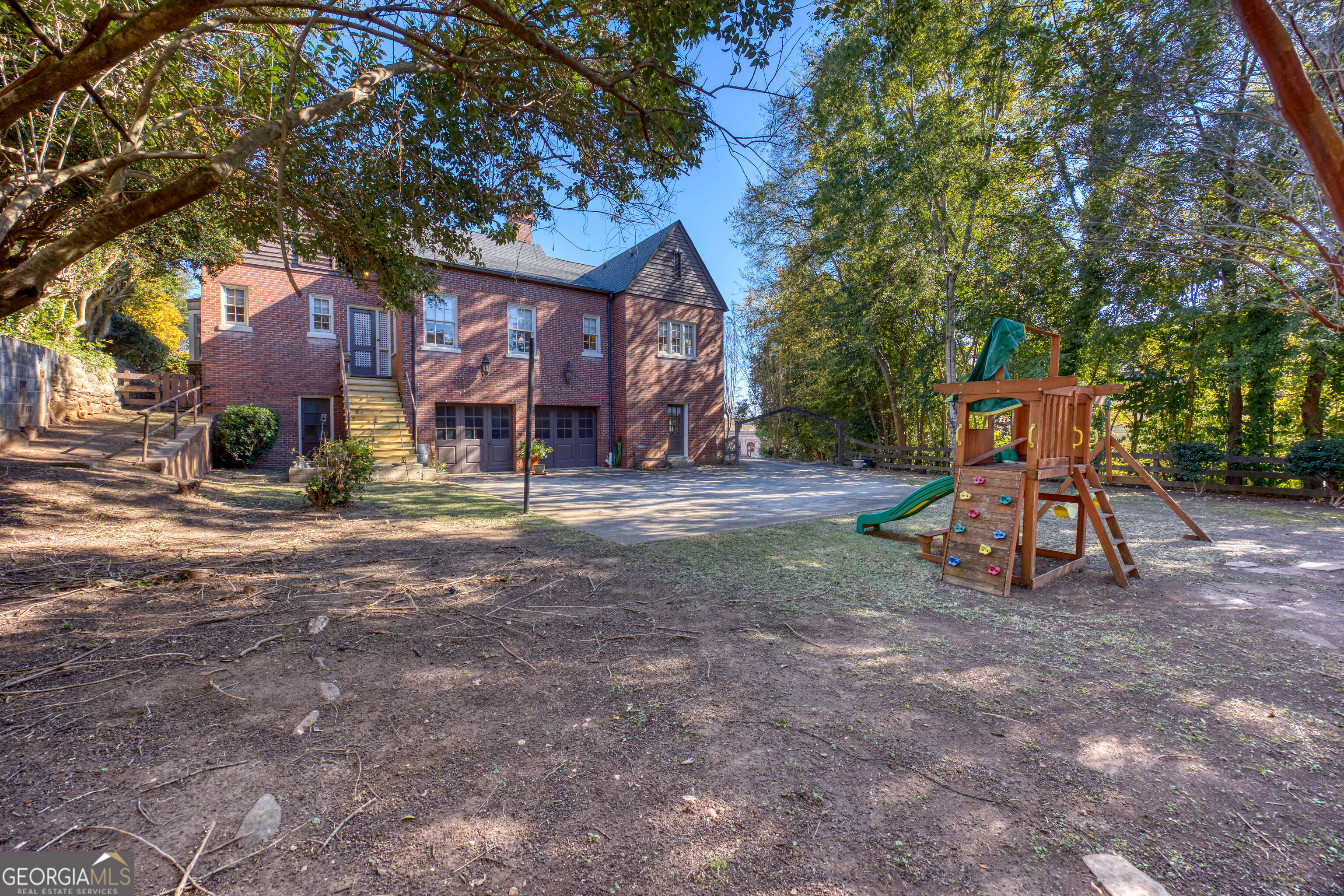 1007 4th Avenue West Point, GA 31833 - Photo 56 of 69 a backyard of a house with barbeque oven table and chairs