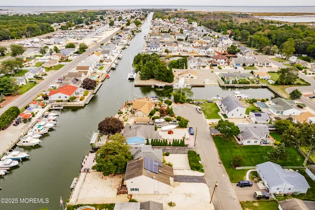 an aerial view of lake residential house with outdoor space
