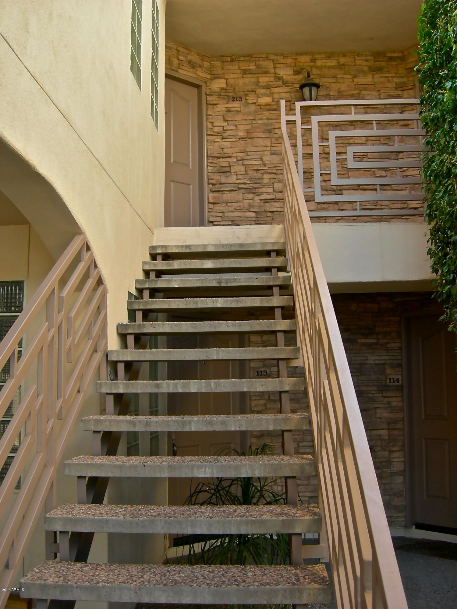 3235 East Camelback Road, Unit 213 Phoenix, AZ 85018 - Photo 3 of 43 Entrance to 213 off carport