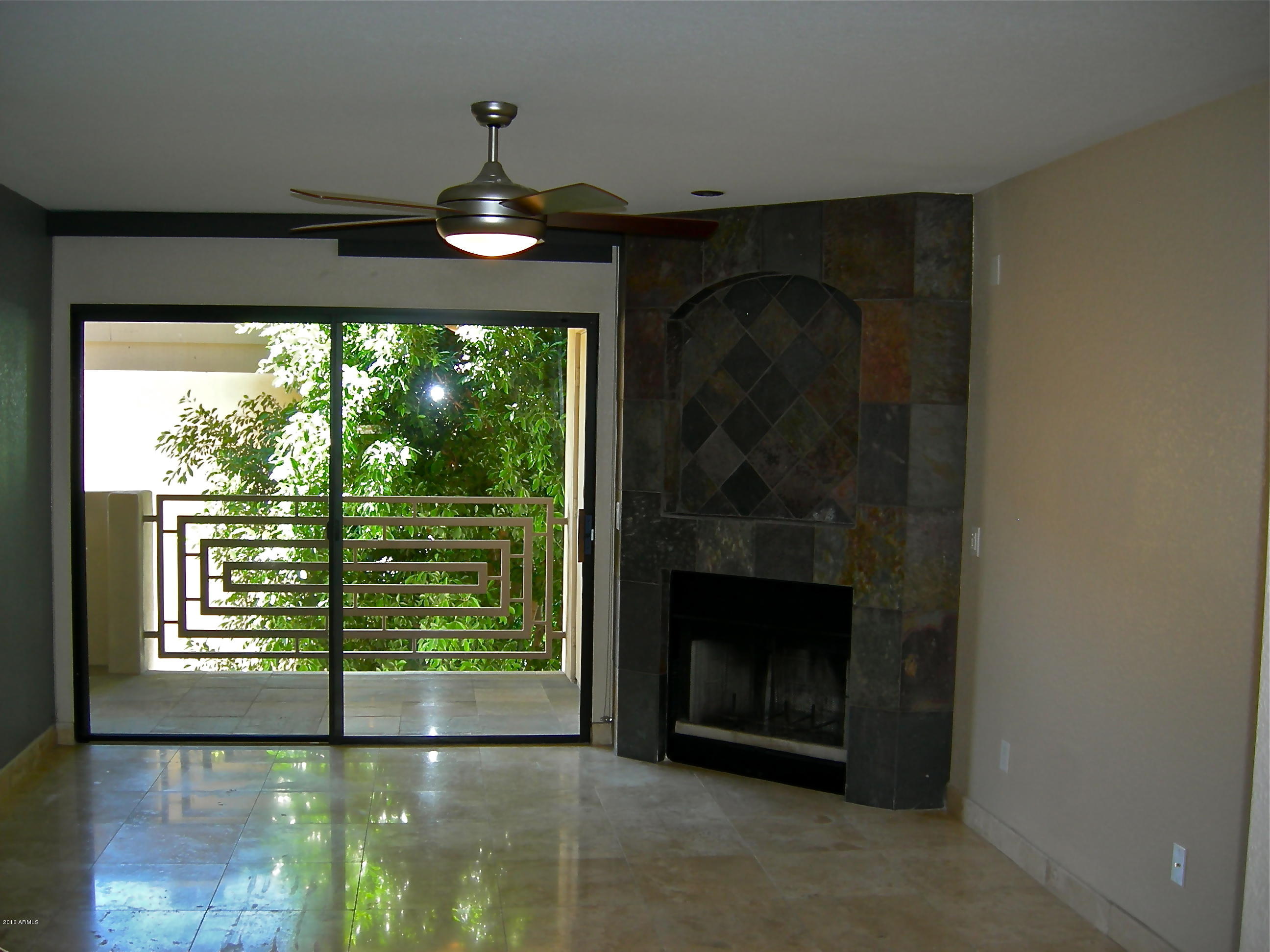 3235 East Camelback Road, Unit 213 Phoenix, AZ 85018 - Photo 7 of 43 Glass Door to Terrace