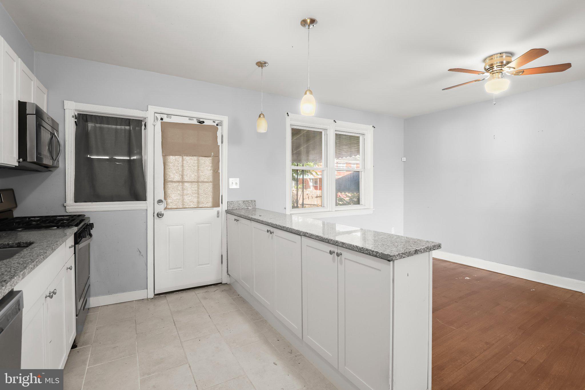 1504 North Linwood Avenue Baltimore, MD 21213 - Photo 10 of 31 Dining Area and Kitchen