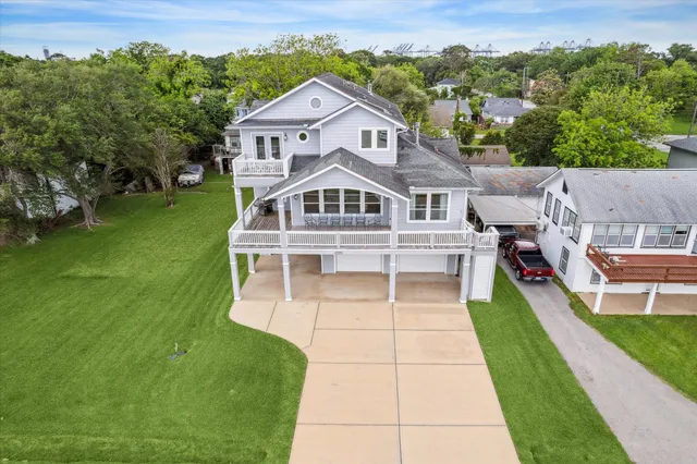 a aerial view of a house with a yard