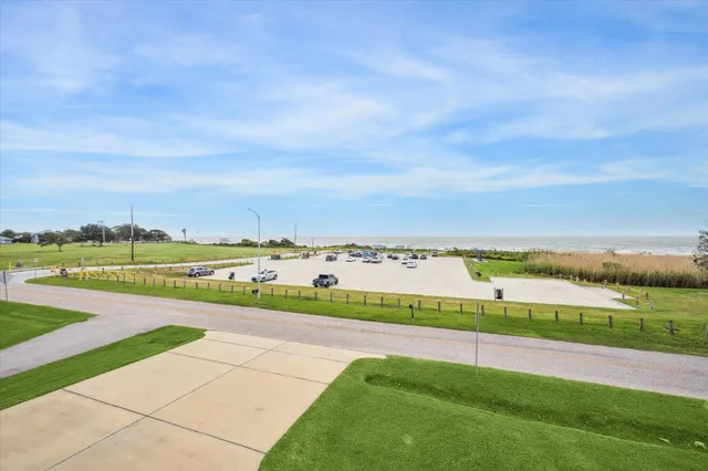 a view of a two chairs in the balcony
