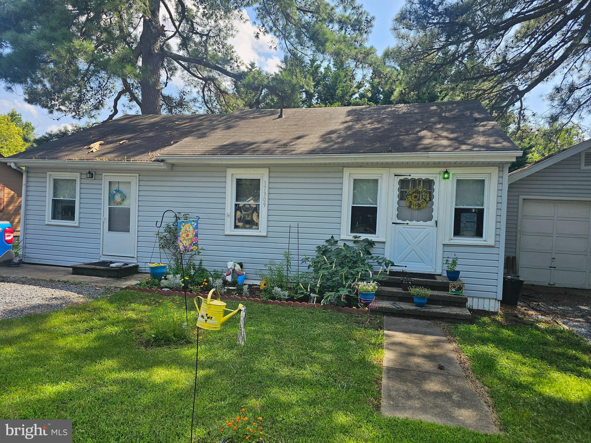 17309 Piney Point Road Piney Point, MD 20674 - Photo 26 of 38 a backyard of a house with seating space