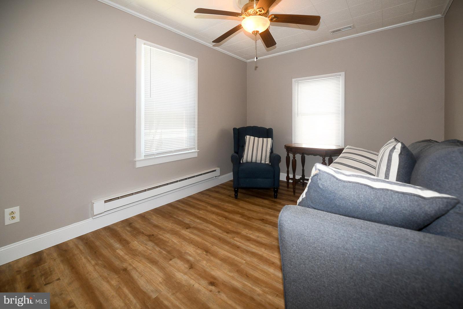 17309 Piney Point Road Piney Point, MD 20674 - Photo 7 of 38 a living room with furniture and a window